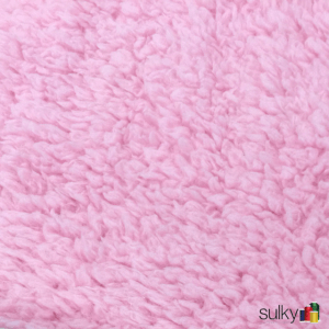 Close-up of soft pink fleece fabric texture.