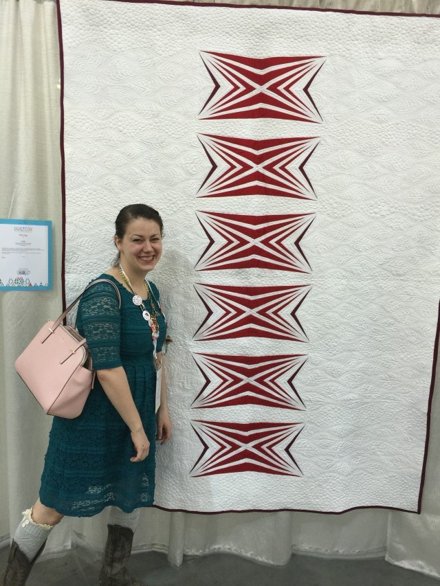 Amy Garro of 13spools.com with her quilt at Quiltcon 2016