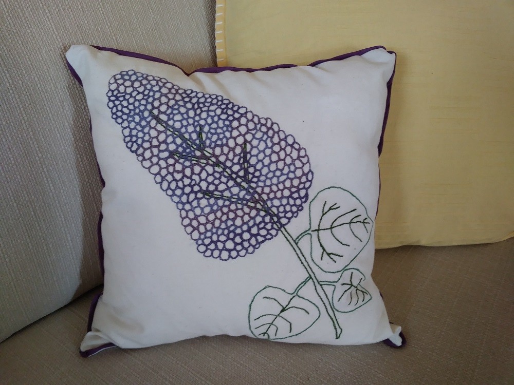 Lilac pillow with free-motion embroidery