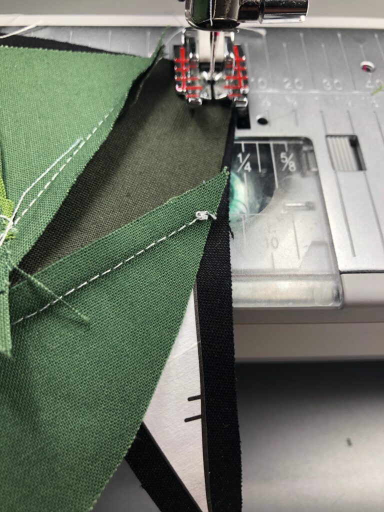 moving piece to align curves as you sew