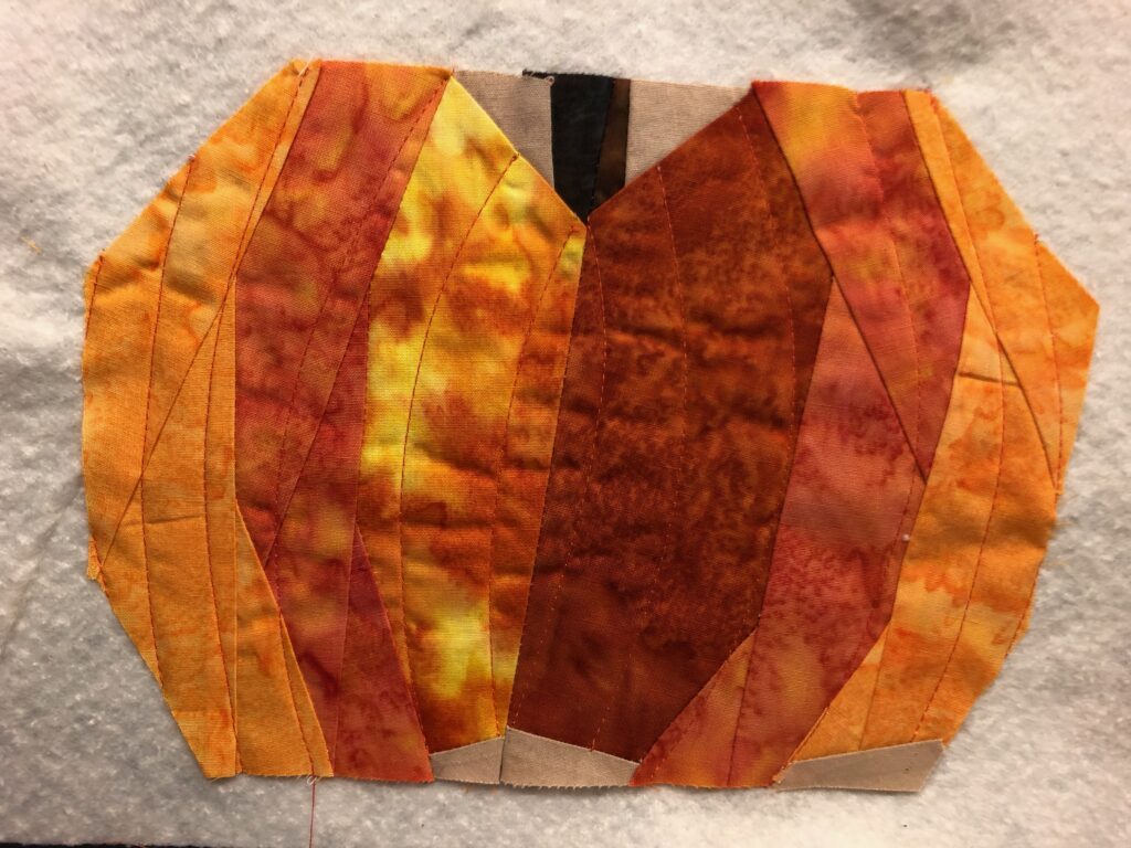 paper pieced pumpkin on batting