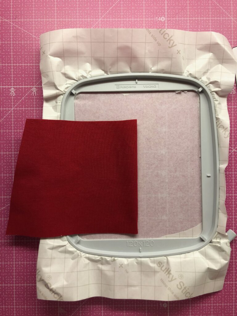 Place Bib on Hoop for Apron Embroidery