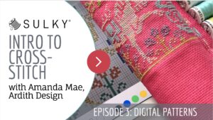 Close-up of colorful textile patterns with a red arrow button and partial text.