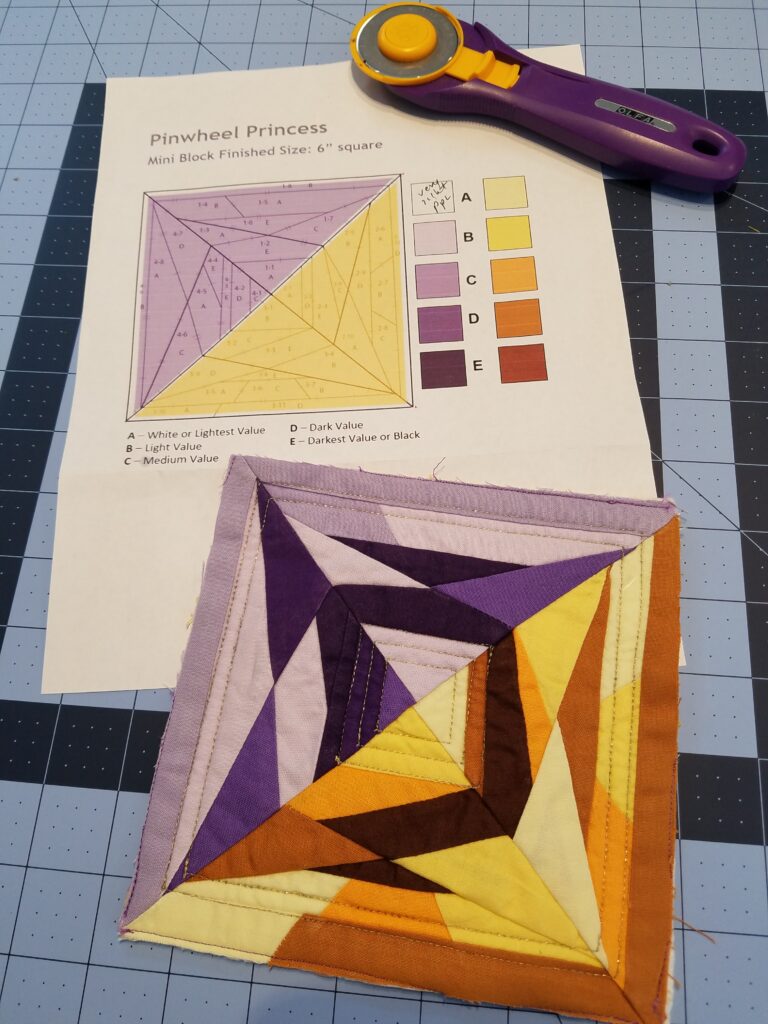 piecing the quilting with sparkle block