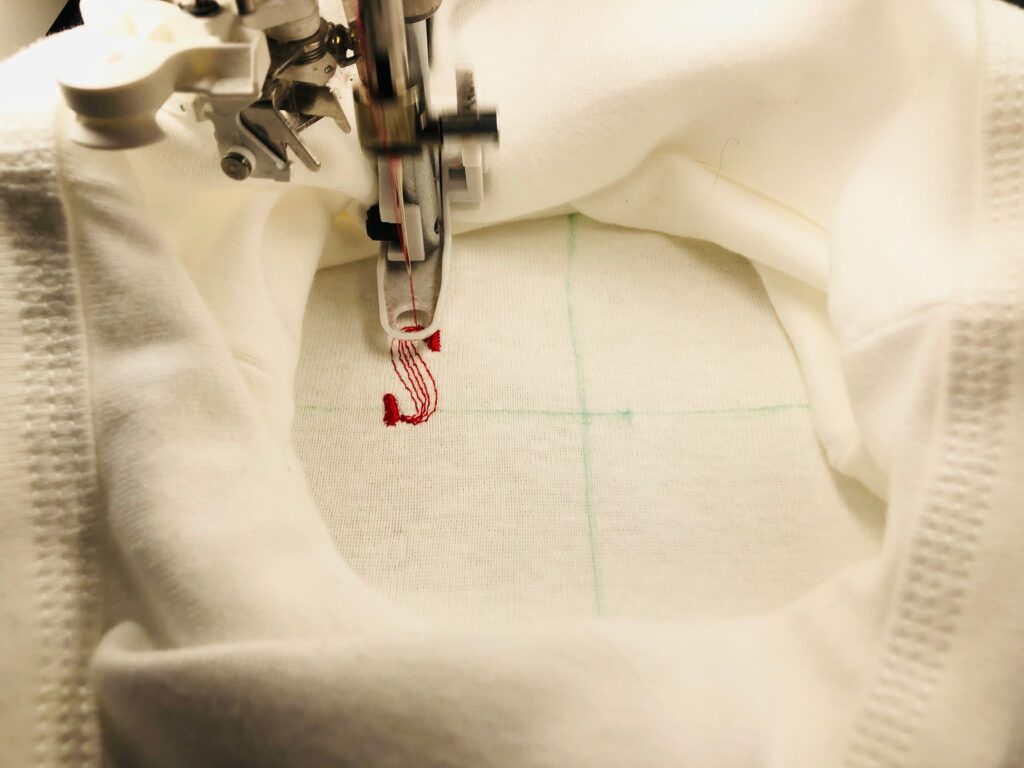 begin embroidery on onesie