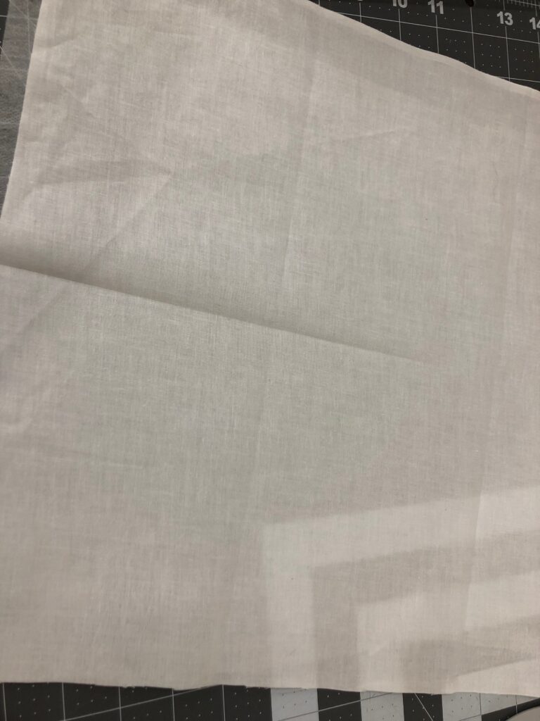 fold towel to create crease marks