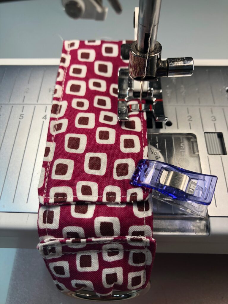 stitching the sides of the stocking stuffer sleeve