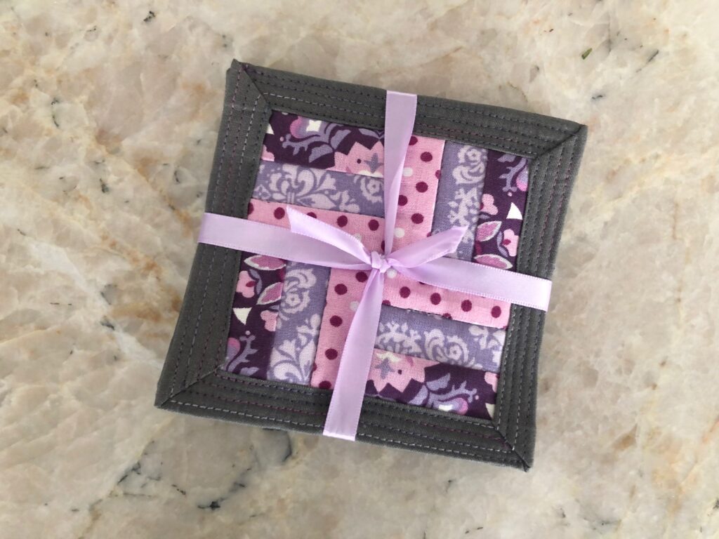 quilted coasters set with ribbon