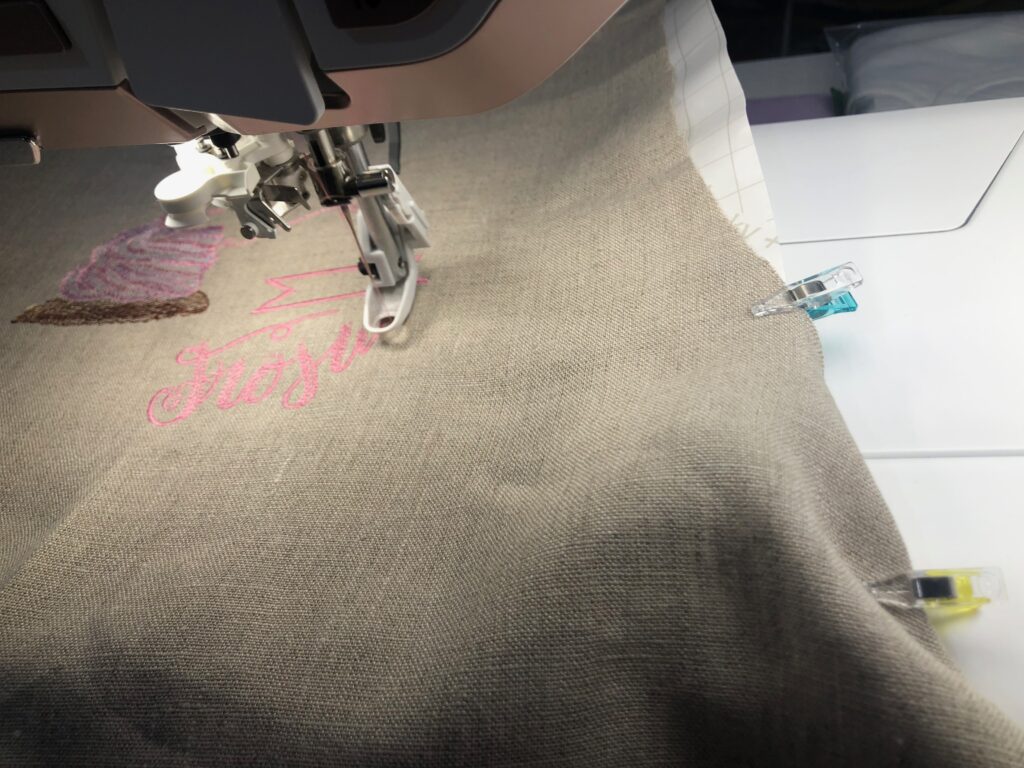 clip apron edges during stitchout