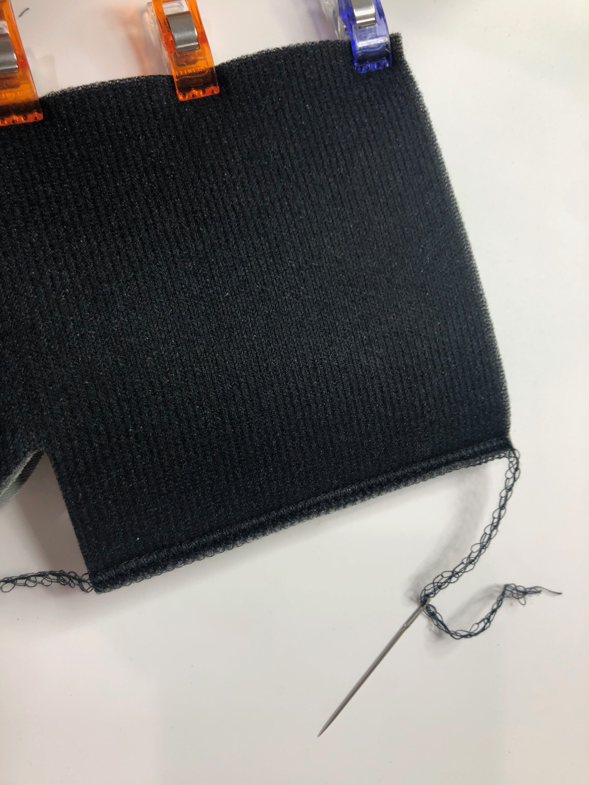 thread serger tail through previous stitching - Sulky