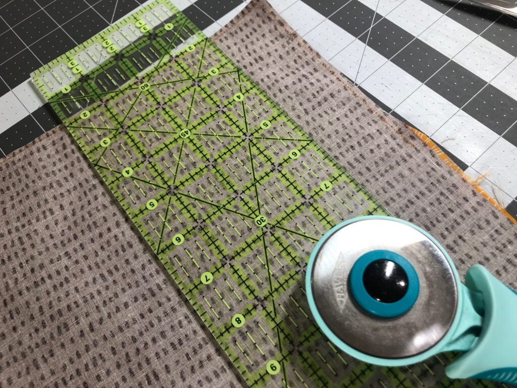 trimming napkin seam allowance with rotary cutter