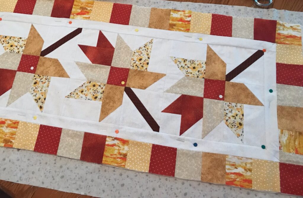 pinning the table runner for quilting