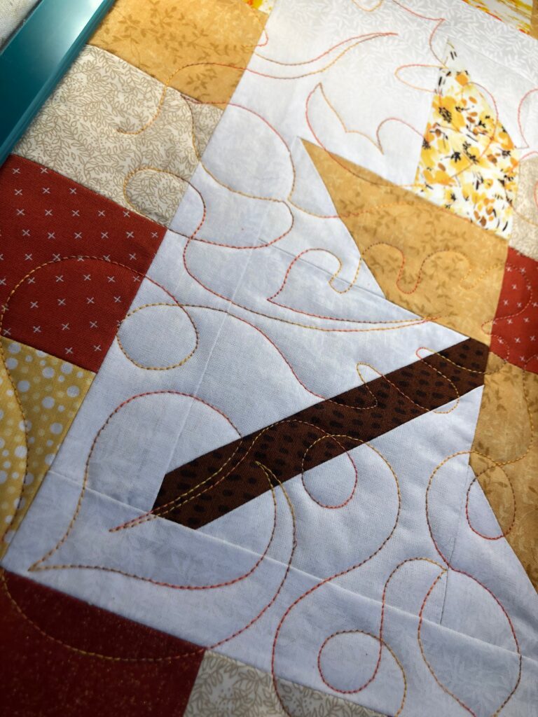 Blenadbles thread on quilted table runner