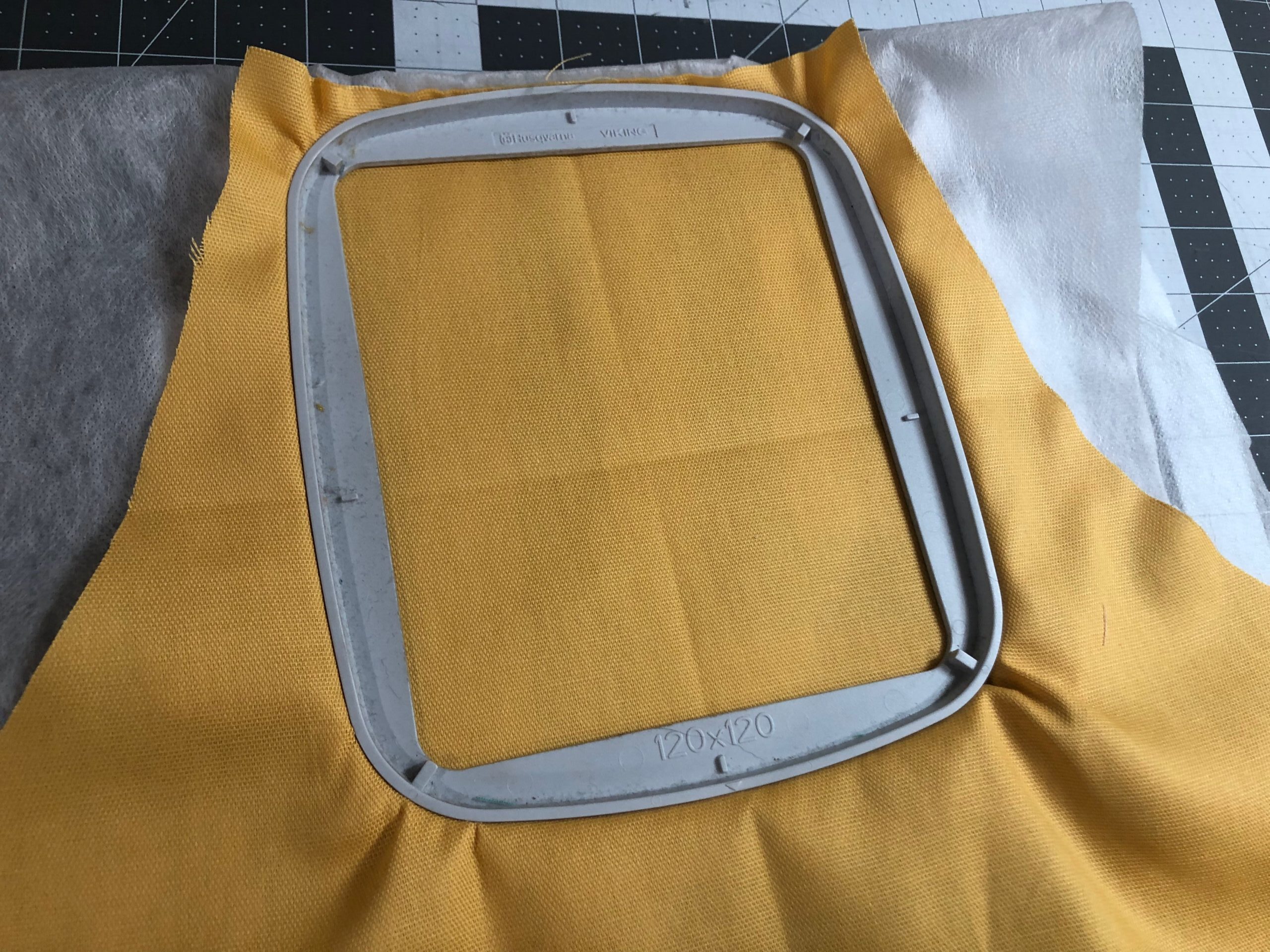 hoop apron fabric with Fabri-Solvy stabilizer