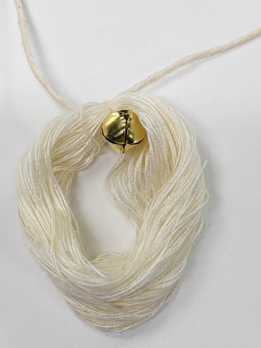 thread wrapped around bell