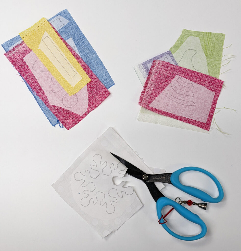 fuse the appliqué fusible web to the fabrics