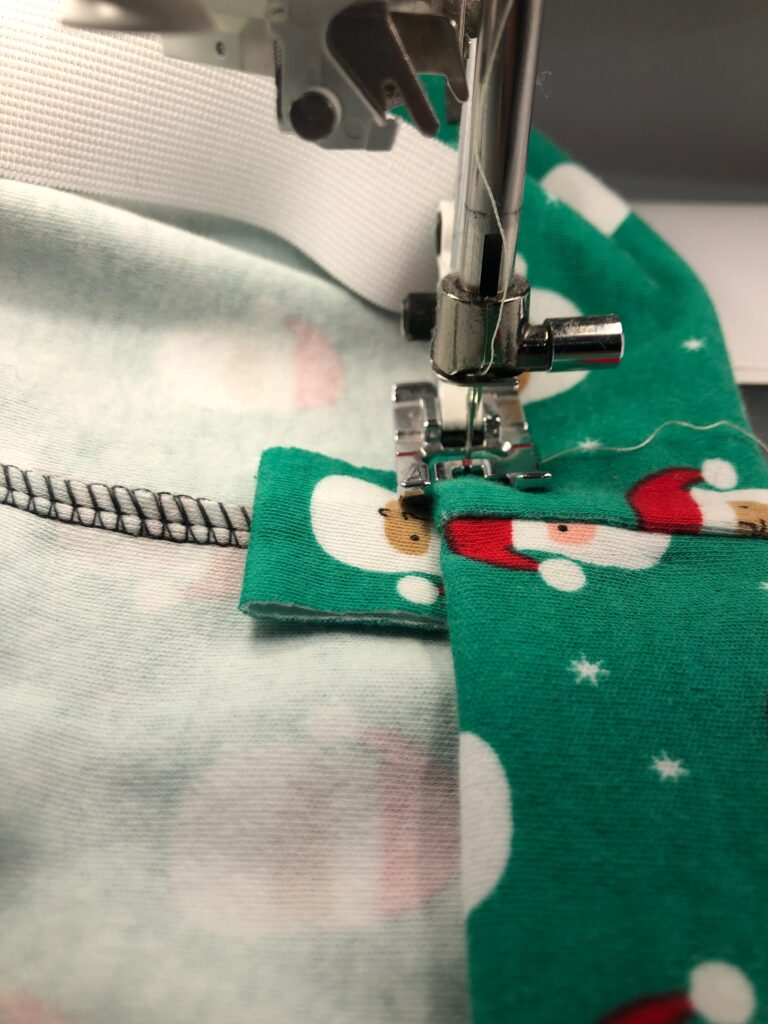 adding tag to center-back seam of pajamas
