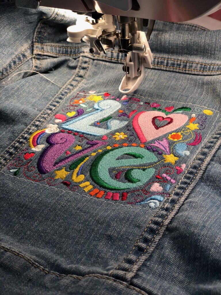 finished embroidery on denim jacket