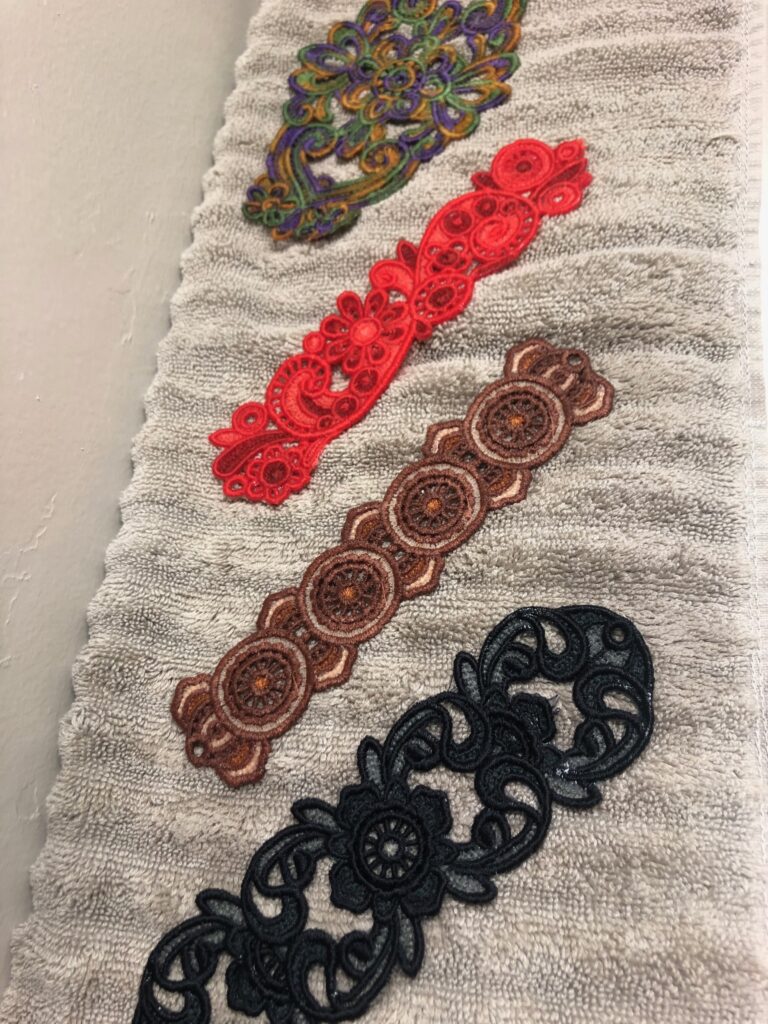 fsl bracelets drying on towel