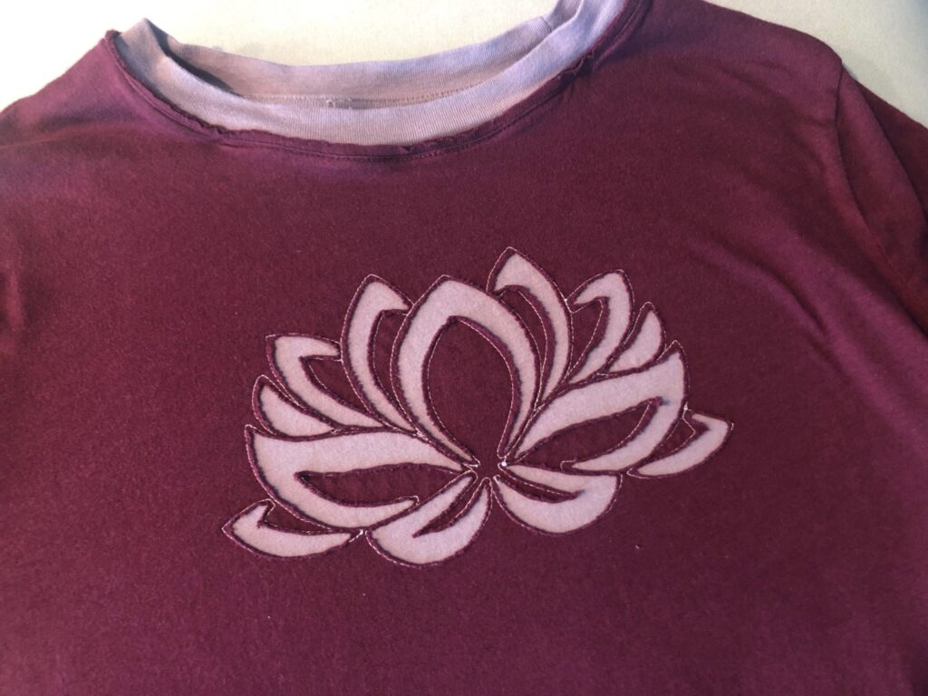 finished stitched lotus design on tee