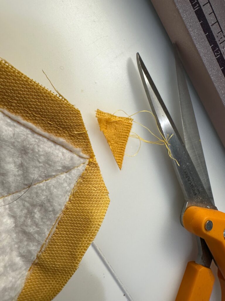 clipping corners of picnic blanket