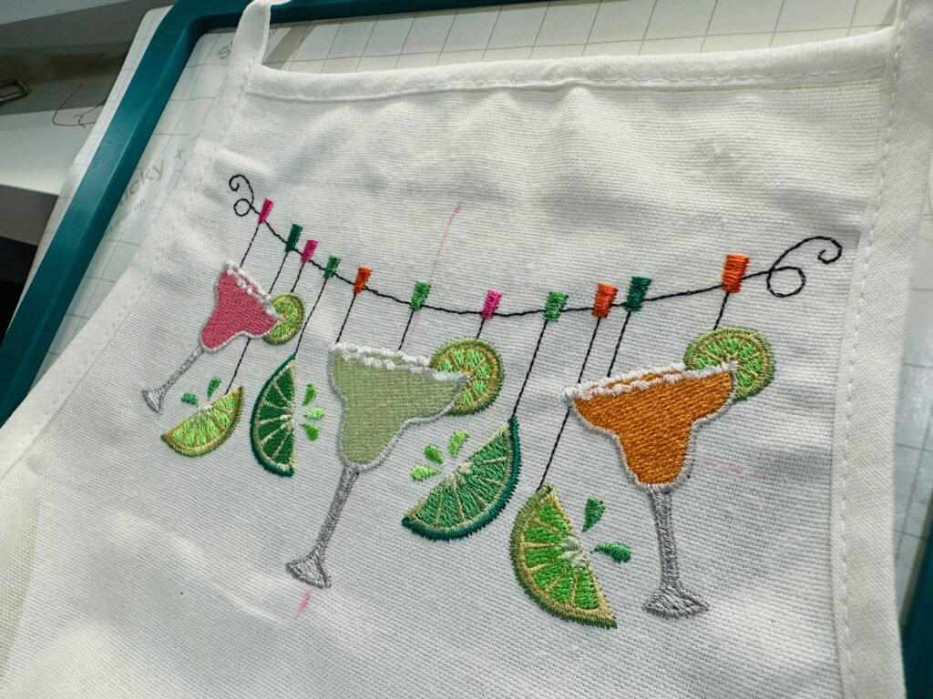 completed embroidery on apron