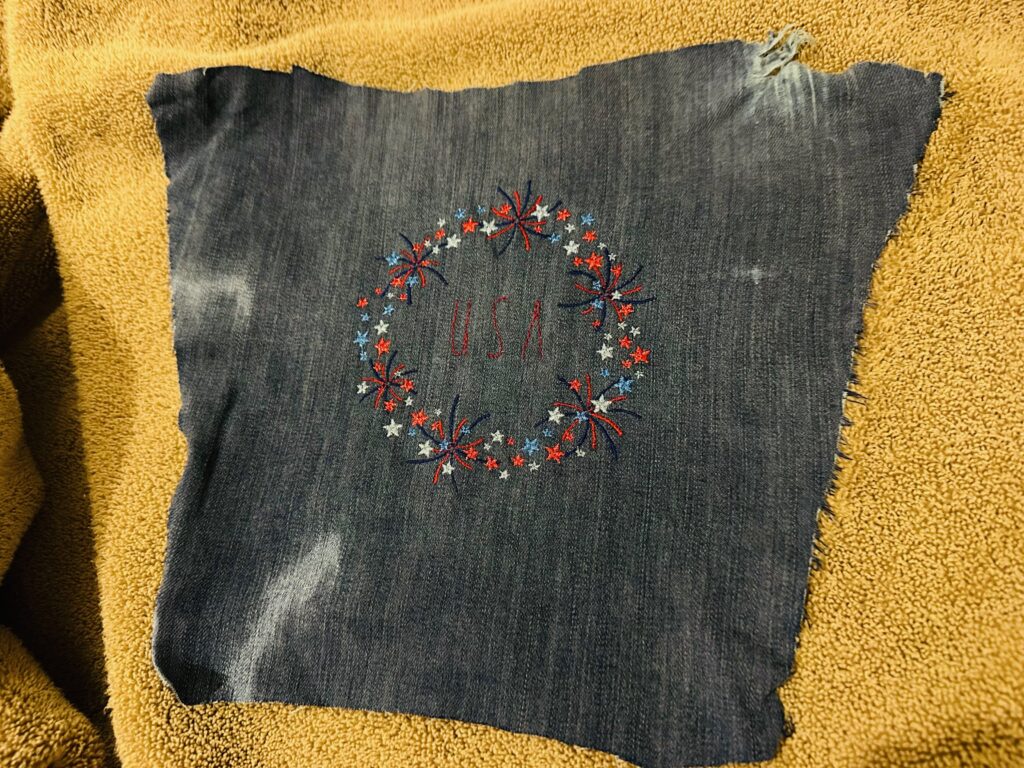 letting embroidery dry on towel