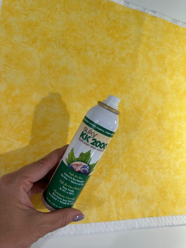 spraying top placemat fabric with KK2000