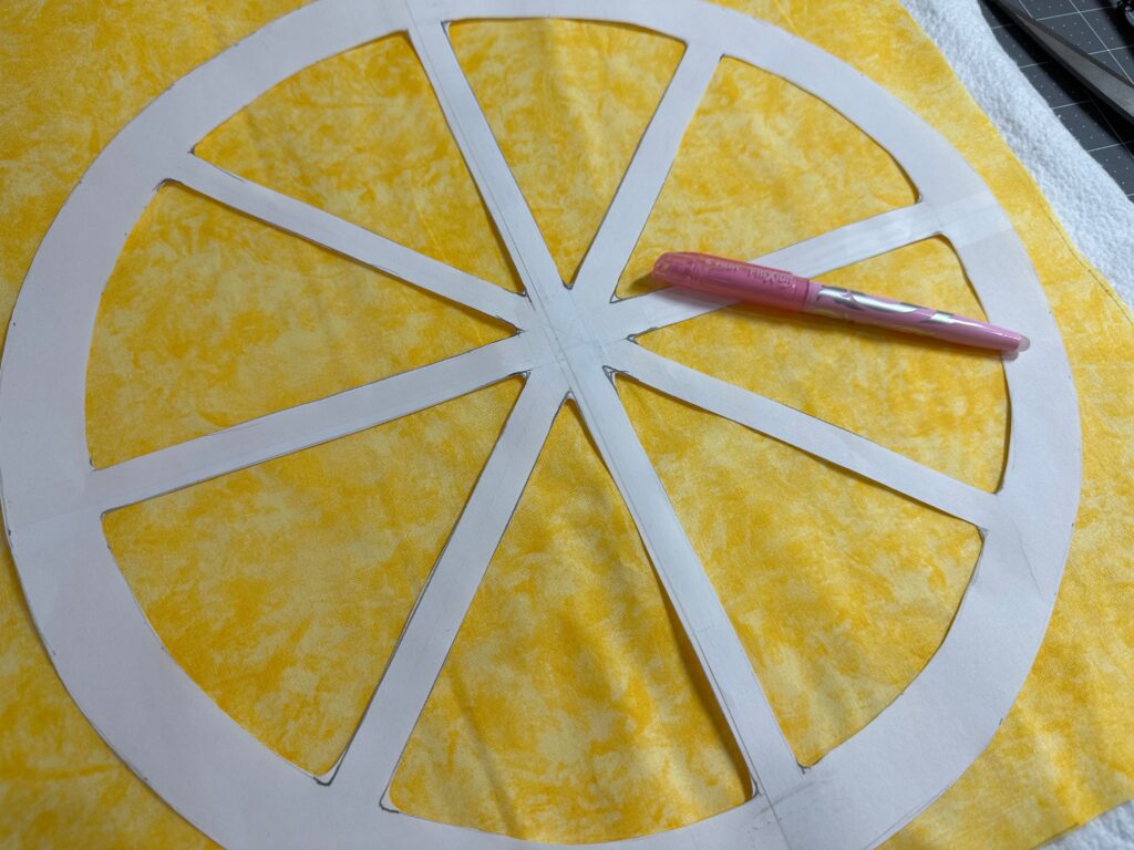 centering citrus slice applique onto quilted fabric