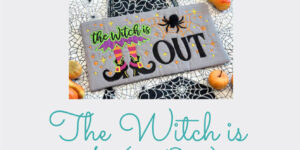 Halloween witch-themed embroidery hoop hanger.