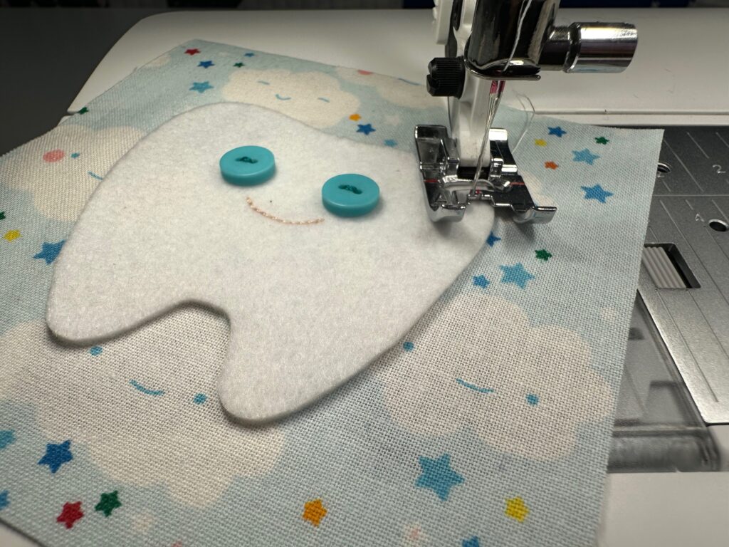 stitching pocket to fabric base