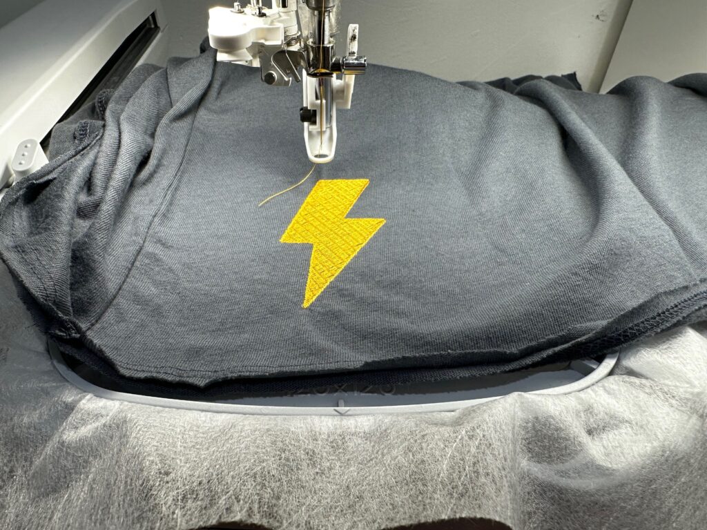 embroidered lightning bolt on top