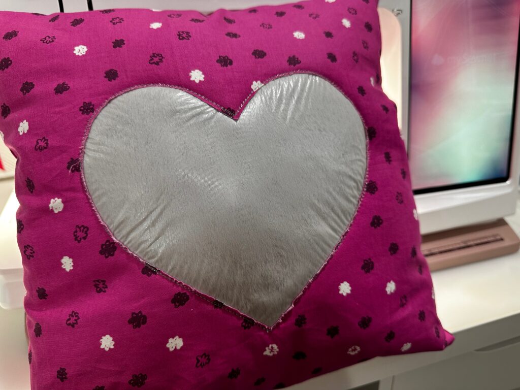 finished pillow by sewing machine