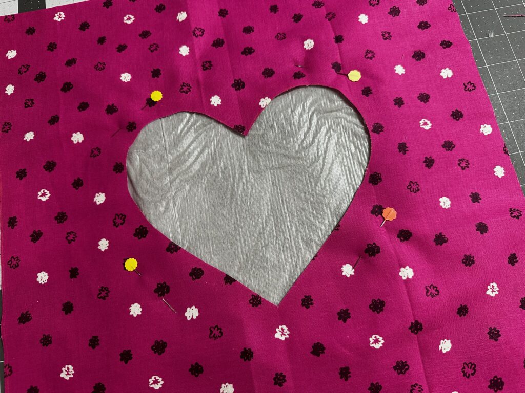 main fabric over plush fabric with heart showing