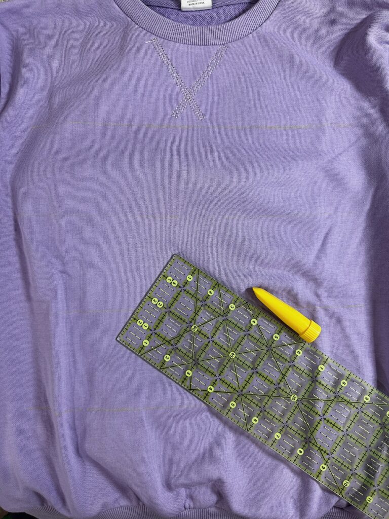 plotting applique placements on sweatshirt