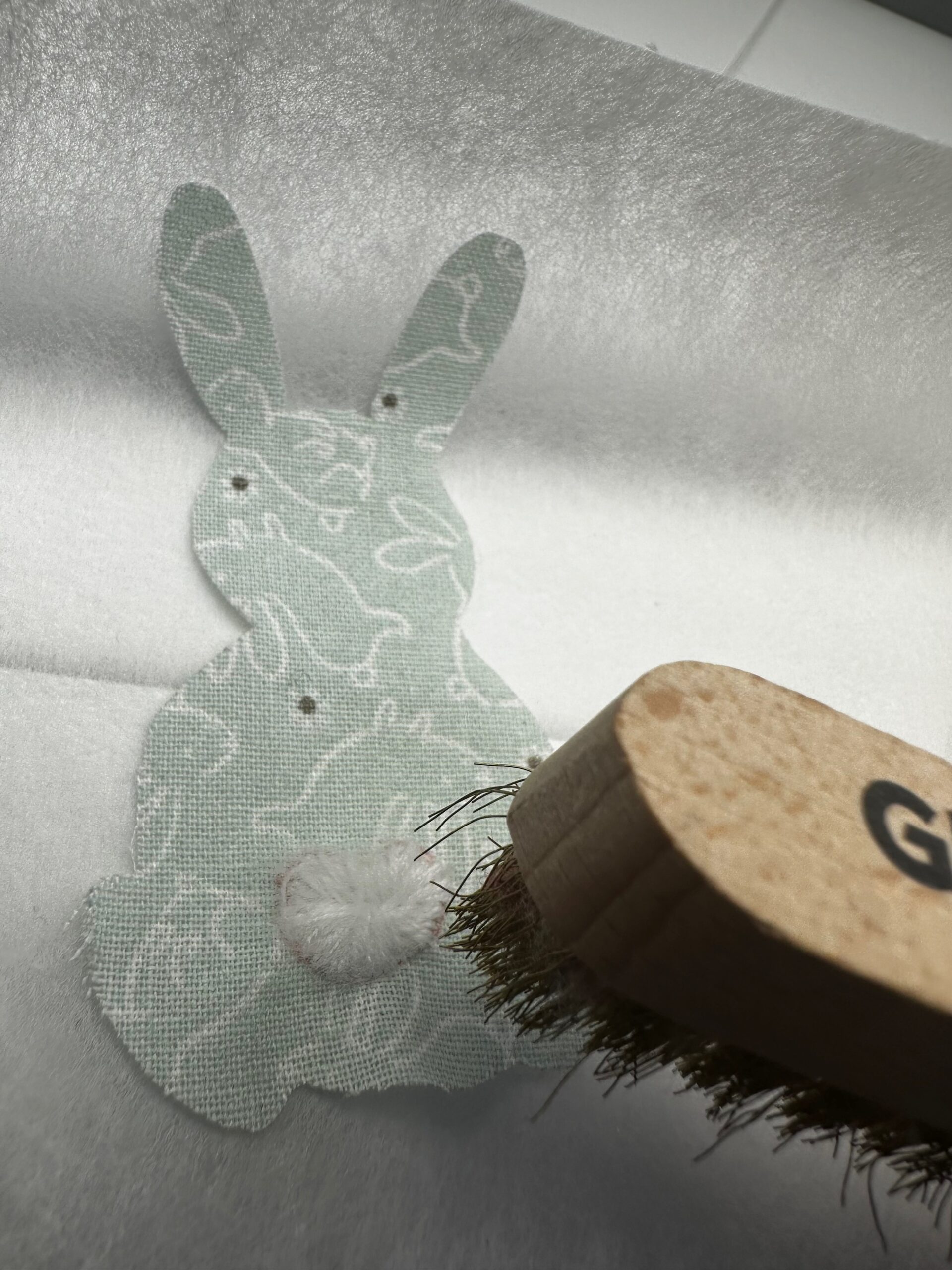 brushing bunny tail with FIlaine wire brush - Sulky