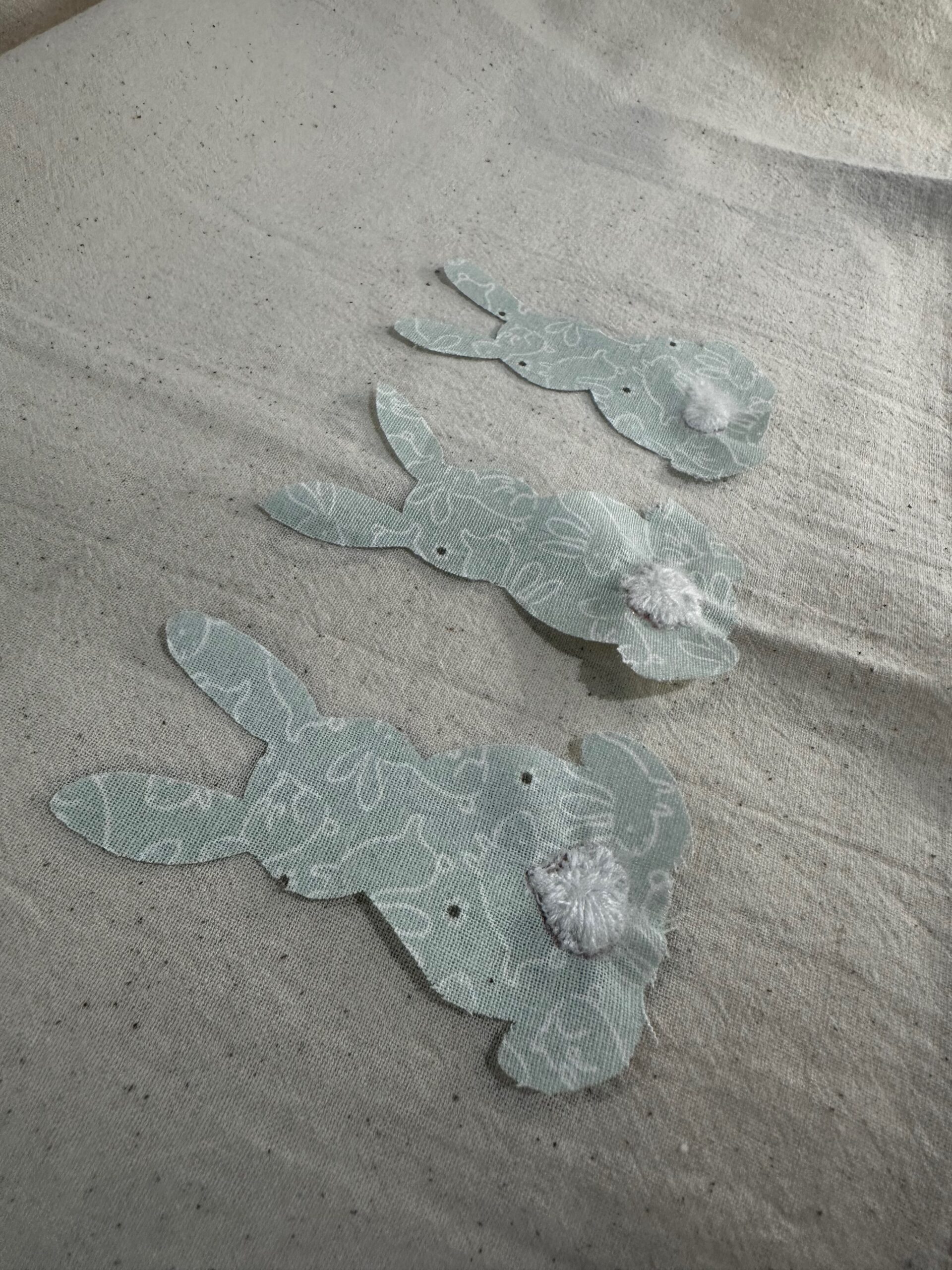 Easter bunny appliques in place on towel right side