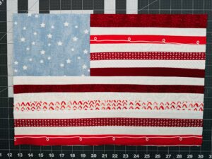 piecing on flag placemat finished