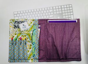 finished opened backpack organizer on table with keyboard