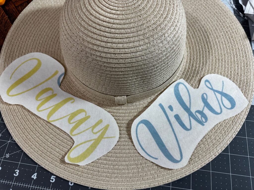 auditioning embroidery design placement on sunhat brim