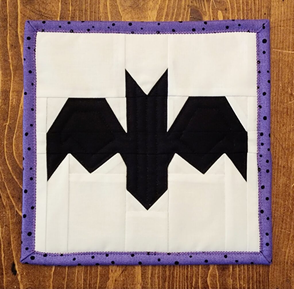 Halloween Mug Rug Bat on Table