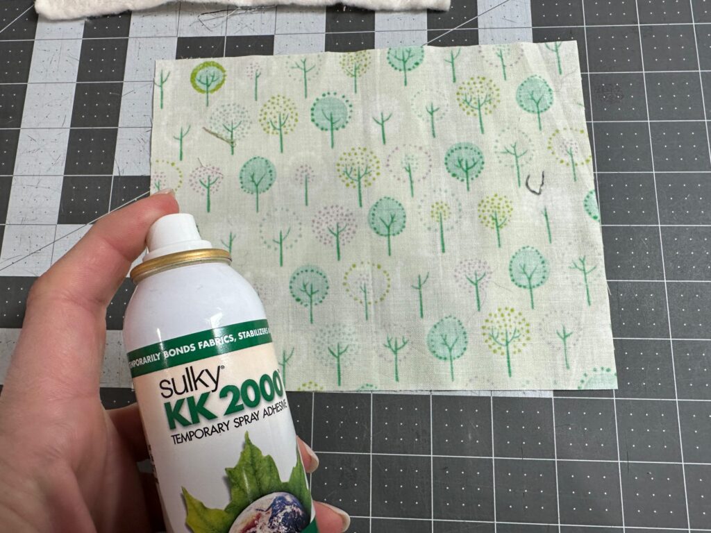 spraying backing fabric with KK2000