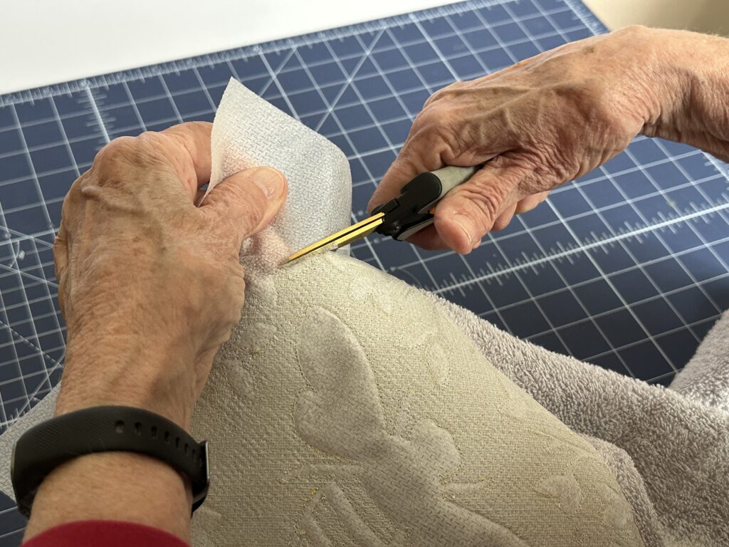 trimming stabilizer from towel wrong side
