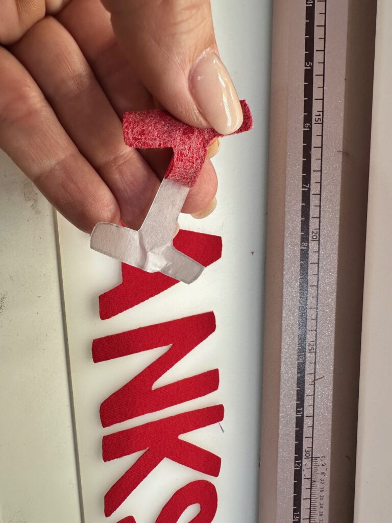 removing paper backing of letters
