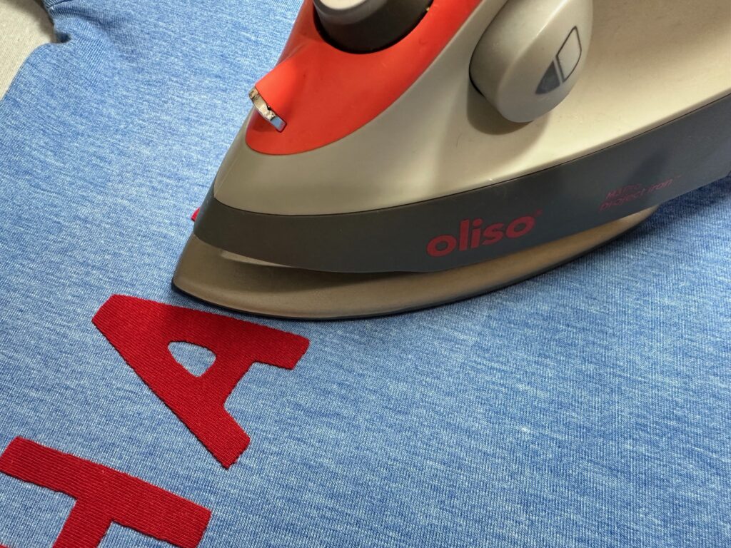 fusing appliqué letters to t-shirt