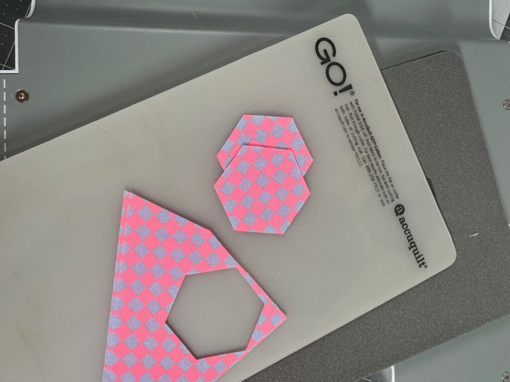 hexagon die with cut fabric