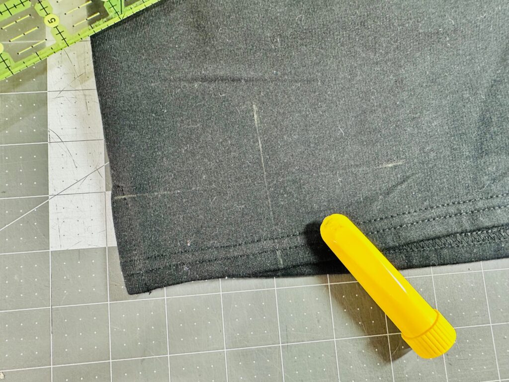 cross marks of design showing on shorts