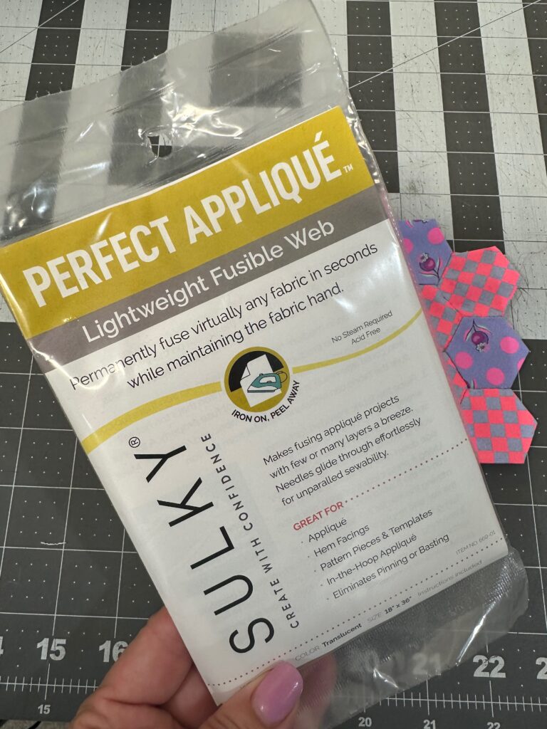 Sulky Perfect Appliqué Fusible Web with EPP Flower in the Background