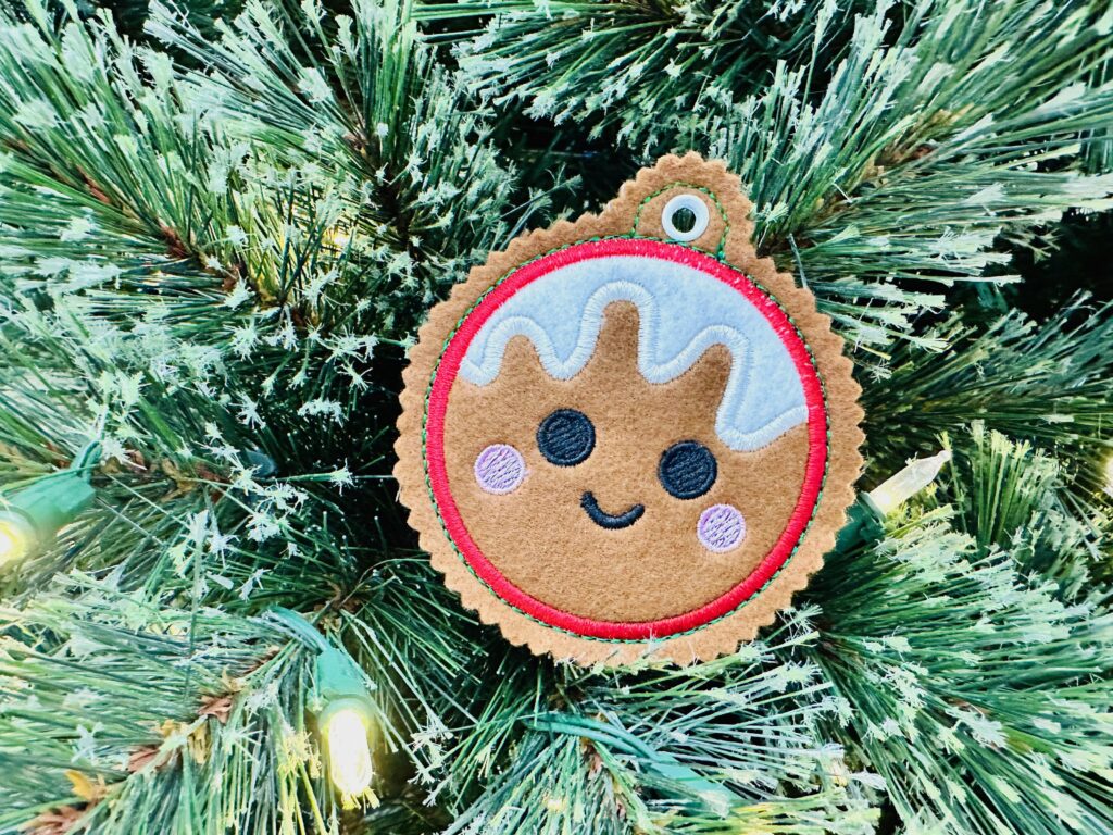 Gingerbread Ornament Kit hanging on tree