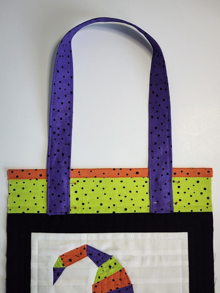handle placed on tote front